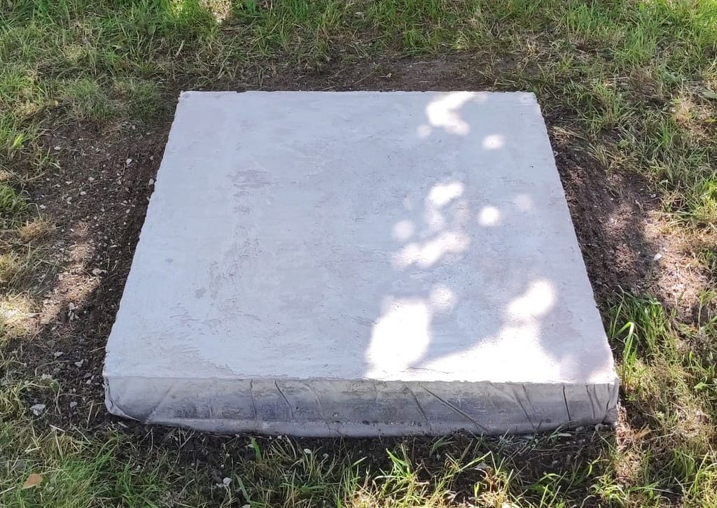 Freshly minted concrete slab for the outdoor pizza oven