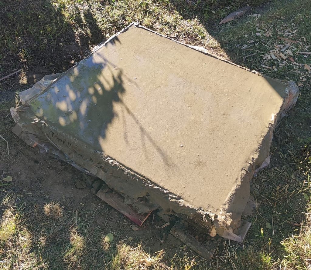 Freshly poured cement sab for the wood fired pizza oven base