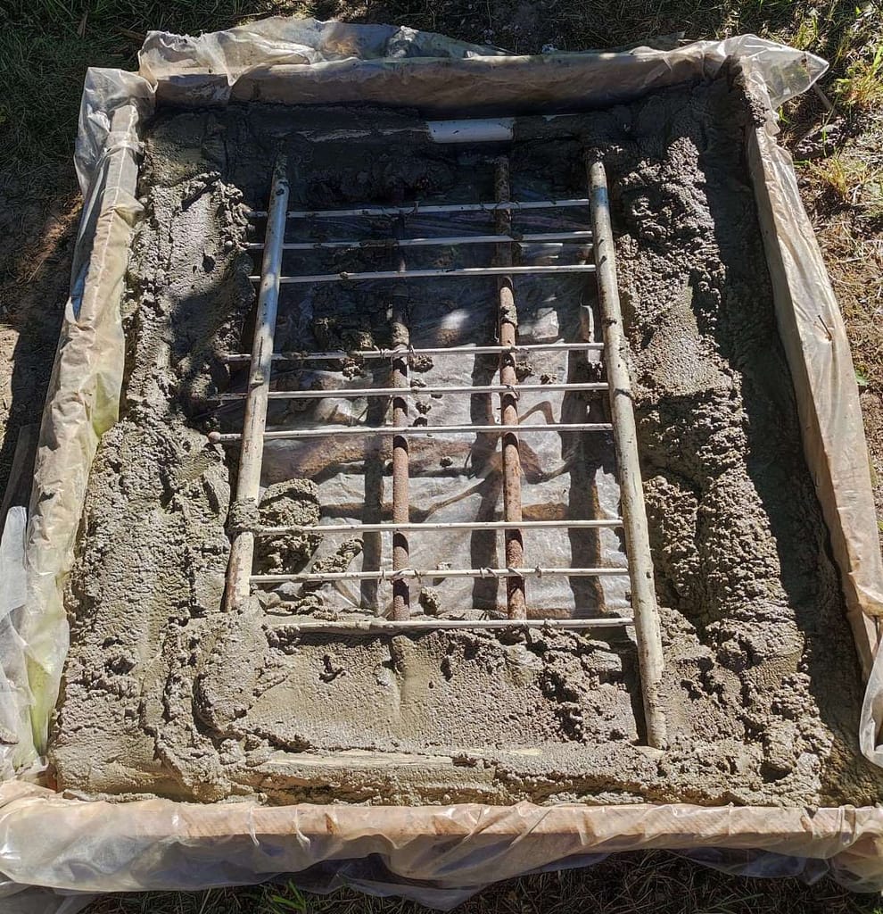 Reinforcing the cement with some random metal peices